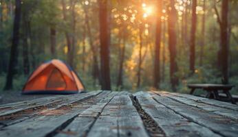 Tent on Wooden Platform in Forest photo