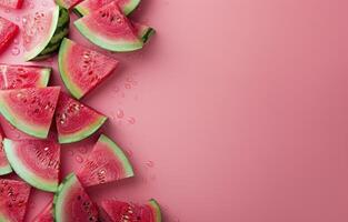 Slices of Watermelon on a Pink Background photo