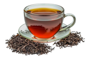 A cup of tea is on a saucer with a pile of tea leaves next to it - stock .. png