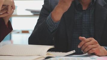 Co working conference, Business team meeting present, investor colleagues discussing new plan financial graph data on office table with laptop and digital tablet, Finance, accounting, investment. video