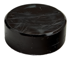 Well-used black hockey puck with scratches, cut out - stock .. png