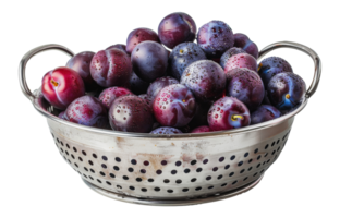 Fresh ripe plums with water drops in metal colander, cut out - stock . png