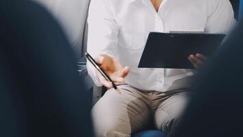 Side view portrait of handsome bearded businessman working while enjoying flight in first class, copy space video