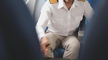 Side view portrait of handsome bearded businessman working while enjoying flight in first class, copy space video