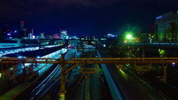 A timelapse of the train at Ueno station at night long exposure wide shot video