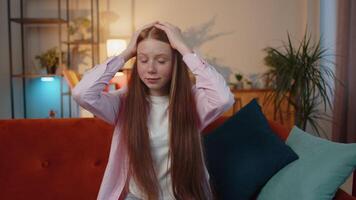 Furious young redhead child girl screams from stress tension problems, panic, shock, horror, scared video