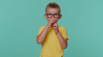 Funny toddler children boy making playful silly facial expressions and grimacing, fooling around video