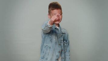 Toddler boy pointing to camera and looking with playful happy expression, making choice, hey you video