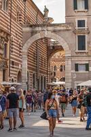 VERONA ITALY 10 SEPTEMBER 2020 Piazza dei Signori in Verona full of people photo