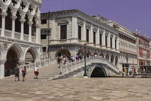 VENICE ITALY 2 JULY 2020 Three quarter view of Sospiri bridge in Venice with people walking photo