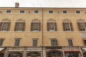 FERRARA ITALY 29 JULY 2020 Ancient building with many windows in Ferrara in Italy photo