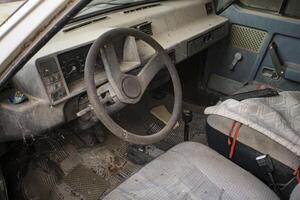 Dashboard of an abandoned car photo