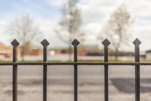 Wrought iron gate detail spikes photo