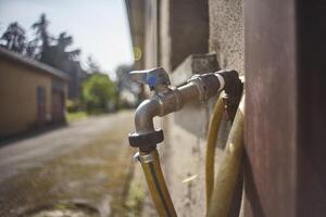 A worn and worn faucet photo