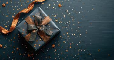 Gift Wrapped in Brown Ribbon With Gold Stars photo