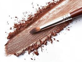 Close Up of a Makeup Brush on a White Surface photo