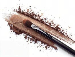 Close Up of a Makeup Brush on a White Surface photo