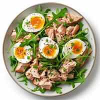 White Bowl Filled With Green Vegetables and Hard Boiled Eggs photo