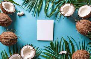 Paper Surrounded by Coconuts on Blue Background photo