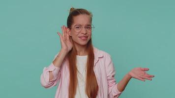 Teen child girl trying hear you looking confused and frowning, keeping arm near ear for louder voice video