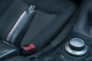 Detail of the handbrake lever of the car 2 photo