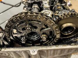 Timing Chain, Dirty and Worn Car Engine photo