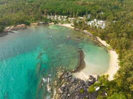 Aerial drone view of beautiful beach with turquoise sea water and palm trees of Gulf of Thailand. Kood island, Thailand photo