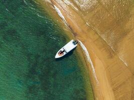 Aerial view of Speed boat in the aqua sea, Drone view photo