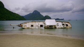 Sunken rusty boat near the coast video