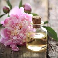 Peony essential oil in bottle photo