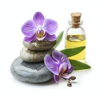 Essentiale ol and massage stone with orchids flower photo