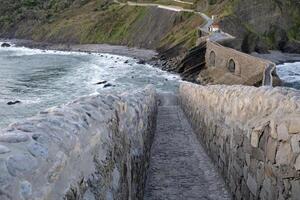 View over San Juan de Gaztelugatxe in Spain during sunrise photo