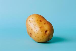 Delve into the beauty of simplicity as a potato takes center stage against a calming light blue backdrop, highlighting the ordinary in an extraordinary way, Generated AI photo