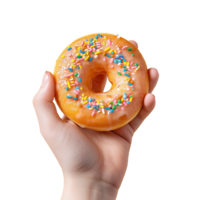 Female hand holding donut over transparent background png