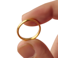 Hand holding gold ring isolated on transparent background png