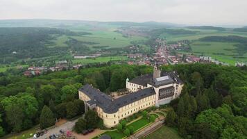 Aerial descending view of chateau Zbiroh in Czechia video