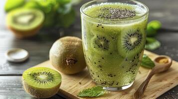 The Refreshing Delight of a Healthy Kiwi Smoothie Elegantly Presented in a Glass photo