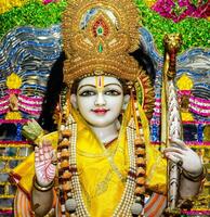 Statue of Rama close up face, hindu god, Rama - He is the seventh and one of the most popular avatars of Vishnu. photo