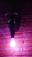 The bulb is burning inside the macine. photo