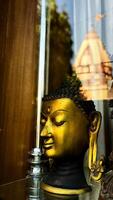 golden head of lord goutam buddha photo