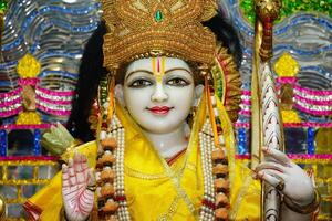 Statue of Rama close up face, hindu god, Rama - He is the seventh and one of the most popular avatars of Vishnu. photo