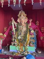 statue of lord ganesha showing hindu religion in india photo