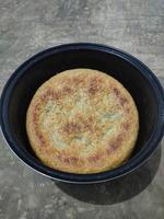 Photo of hardened rice, dry rice on magic com, the rice is dry and then hardened until it turns brownish. burnt rice, crusty rice