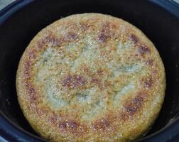 Photo of hardened rice, dry rice on magic com, the rice is dry and then hardens until it turns brownish