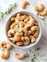 Cashew Nuts in Ceramic Bowl photo