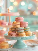 Elegant macaron tower on pastel cake stand. photo