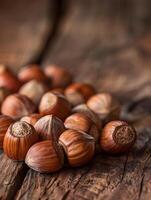 Hazelnuts on wooden surface photo