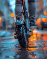 Electric scooter on a rainy city street. photo