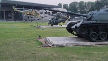 Army equipment using in war are placed in public park for kids in Lahore, Pakistan on May 15, 2024. photo