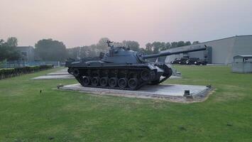 Army equipment using in war are placed in public park for kids in Lahore, Pakistan on May 15, 2024. photo